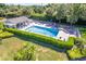Beautiful community pool with ample seating and a covered lounge area, perfect for relaxing and enjoying the sun at 821 Waterside Dr # 205, Venice, FL 34285
