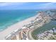 An aerial view showing the beautiful beachfront condos, marina and the Gulf of Mexico at 950 Tarpon Center Dr # 504, Venice, FL 34285