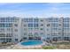 Lovely condominium building with stunning views, with a large swimming pool at 950 Tarpon Center Dr # 504, Venice, FL 34285
