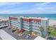 A beautiful high rise condo building with beach front views and a parking area at 950 Tarpon Center Dr # 504, Venice, FL 34285
