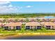 Aerial view of the neighborhood featuring waterfront properties and lush landscaping at 10808 Tarflower Dr # 102, Venice, FL 34293