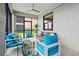 Cozy outdoor lanai with modern furniture and beautiful views at 10808 Tarflower Dr # 102, Venice, FL 34293