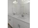 Bathroom featuring double sinks and modern fixtures at 11228 Fieldstone Dr, Palmetto, FL 34221