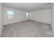 Neutral-toned bedroom with ample space and natural light at 11228 Fieldstone Dr, Palmetto, FL 34221