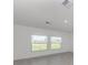 Bright bedroom with natural light streaming through the windows at 11228 Fieldstone Dr, Palmetto, FL 34221