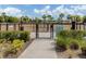 Dog park with fencing, a double-gated entry, and green space for pets to play at 11228 Fieldstone Dr, Palmetto, FL 34221