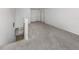 Upstairs loft area with neutral carpet and natural light at 11228 Fieldstone Dr, Palmetto, FL 34221