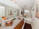 Bathroom featuring a wooden vanity, tile floors, and shower/tub combo at 1234 Paradise Way, Venice, FL 34285