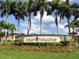 Elegant entrance sign for the Gran Paradiso community, surrounded by lush landscaping at 12728 Richezza Dr, Venice, FL 34293
