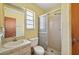 Full bathroom featuring a vanity, toilet and a glass-enclosed shower at 1316 Ridgewood Ave, Venice, FL 34285