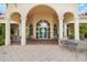 Beautiful clubhouse featuring a spacious patio with tables and chairs for residents' relaxation and enjoyment at 13873 Karina St, Venice, FL 34293