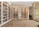A cozy community library boasting floor to ceiling bookshelves and an excellent spot for reading and learning at 13873 Karina St, Venice, FL 34293