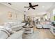 Bright living room flows into the open floor plan of this beautiful home at 13873 Karina St, Venice, FL 34293
