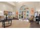 An elegant lobby featuring comfortable seating, artwork, and a bright, welcoming atmosphere for residents and guests at 13873 Karina St, Venice, FL 34293