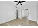 Large bedroom with ample closet space, natural light, and ceiling fan at 140 Poinsettia Ne Cir, Port Charlotte, FL 33952