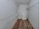 Walk-in closet with wire shelving and a small dresser at 143 Braemar Ave, Venice, FL 34293