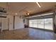 Spacious two car garage with concrete flooring and a glass garage door at 172 Altair Rd, Venice, FL 34293