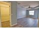 Serene main bedroom with tile floors, a ceiling fan, and a walk-in closet at 172 Altair Rd, Venice, FL 34293