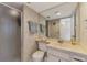 Cozy bathroom featuring a glass shower, toilet, and sink with classic vanity at 1730 Manasota Beach Rd # 215, Englewood, FL 34223