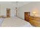 Bedroom boasts an en-suite bathroom and closet access at 1730 Manasota Beach Rd # 215, Englewood, FL 34223