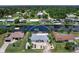 Home with a two car garage, waterfront access and screened in pool at 18302 Burkholder Cir, Port Charlotte, FL 33948