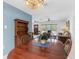 The dining room is bright with lots of natural light and offers vintage hutch at 18302 Burkholder Cir, Port Charlotte, FL 33948