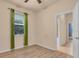 Bedroom featuring a modern ceiling fan and large window at 2150 Snapdragon Ln, Venice, FL 34292