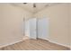 Bedroom featuring a modern ceiling fan and a large closet at 2150 Snapdragon Ln, Venice, FL 34292
