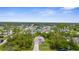 Aerial view of a charming neighborhood featuring lush greenery and well-maintained homes at 2267 Yalta Ter, North Port, FL 34286