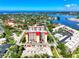 Stunning aerial view of Venice Costa Brava condos with beautiful water views and lush surroundings at 232 Saint Augustine Ave # 505, Venice, FL 34285