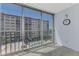 Balcony with sliding glass doors and a view of the pool and courtyard at 232 Saint Augustine Ave # 505, Venice, FL 34285