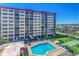 Overhead view of pool and exterior of condo building at 232 Saint Augustine Ave # 505, Venice, FL 34285