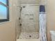 Shower featuring neutral tile, two built-in soap boxes, and a chrome shower head and handle at 2331 Mission Valley Blvd, Nokomis, FL 34275