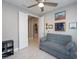 Relaxing living room with a neutral sofa and a view of an adjacent space offers a versatile layout at 249 Tracino Ter, Nokomis, FL 34275