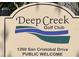 Deep Creek Golf Club community sign welcomes the public to its location on San Cristobal Drive at 25509 Arequipa Dr, Punta Gorda, FL 33983