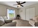 Cozy living room with a serene view from the window, comfortable seating, and a relaxing ambiance at 25509 Arequipa Dr, Punta Gorda, FL 33983
