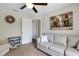 Welcoming living room with neutral tones, a comfortable sofa, and a serene atmosphere at 25509 Arequipa Dr, Punta Gorda, FL 33983