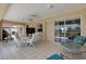 Inviting covered patio with comfortable seating and picturesque views, great for outdoor entertaining at 25509 Arequipa Dr, Punta Gorda, FL 33983