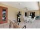 Relaxing covered patio with ample seating and a tranquil ambiance, ideal for outdoor gatherings at 25509 Arequipa Dr, Punta Gorda, FL 33983