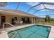 Beautiful pool with screened lanai, perfect for entertaining or relaxing in a private outdoor space at 25509 Arequipa Dr, Punta Gorda, FL 33983