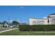 Entrance sign to the Jackson Crossing community with manicured bushes in front and a speed limit sign on the side at 3003 58Th E Way, Palmetto, FL 34221