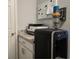 Desk area with printer, vacuum, and organization board; a convenient, space-saving design for any home at 3003 58Th E Way, Palmetto, FL 34221