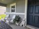 Inviting front porch with comfortable seating and stylish welcome decor at 3003 58Th E Way, Palmetto, FL 34221