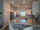 Bright kitchen featuring stainless steel appliances, white cabinetry, and a breakfast bar at 3003 58Th E Way, Palmetto, FL 34221