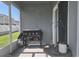 Relaxing screened porch with a Blackstone grill, offering an ideal space for outdoor cooking and entertaining at 3003 58Th E Way, Palmetto, FL 34221