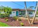 Inviting home with mature landscaping features a stylish entrance and well-maintained exterior, creating a warm, welcoming feel at 301 Gulf Dr, Venice, FL 34285
