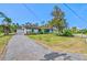 Charming single-story home with well-maintained landscaping and a long driveway at 301 Gulf Dr, Venice, FL 34285