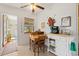Cozy kitchen with a small table and updated appliances, perfect for casual dining and morning coffee at 301 Gulf Dr, Venice, FL 34285
