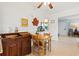 Eat-in kitchen with cozy dining nook, perfect for enjoying meals with a charming vintage table and furnishings at 301 Gulf Dr, Venice, FL 34285