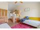 Cozy living room features a vaulted ceiling, kitchenette, and eclectic decor at 301 Gulf Dr, Venice, FL 34285
